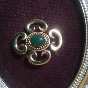 Gold tone and  green brooch